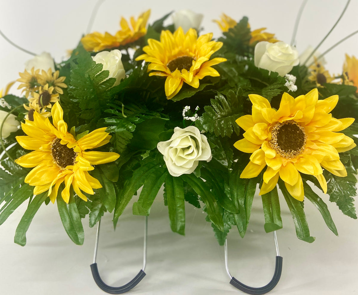 Cemetery Saddle Headstone Decoration With Yellow Sunflowers And Cream